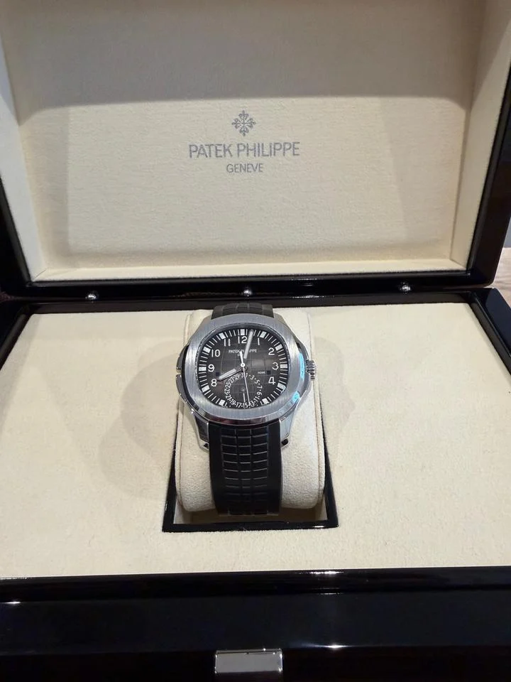 Patek Philippe Aquanaut Travel Time 2021 Full Set Additional New Strap Included.